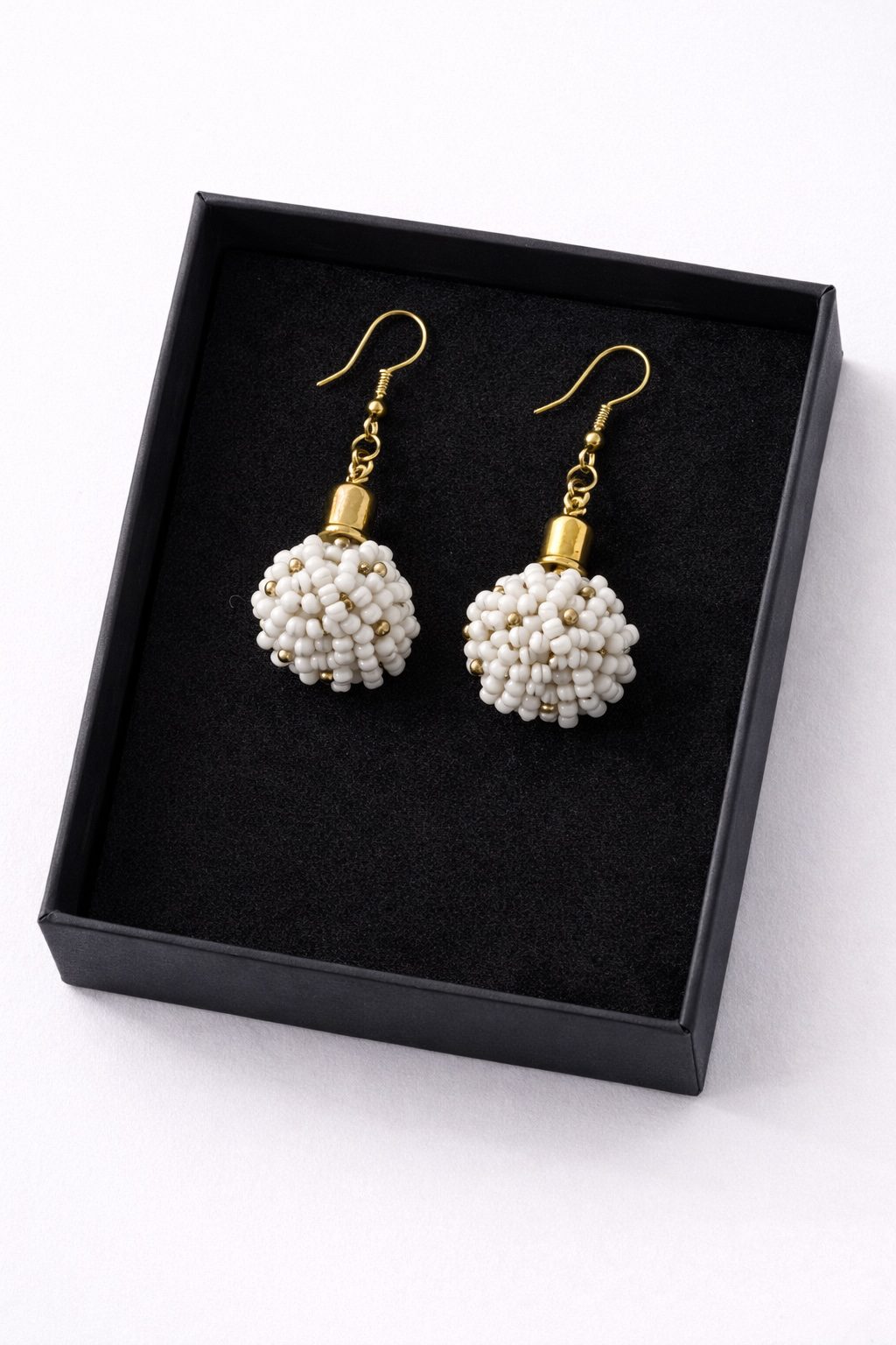 White Beaded Drop Earrings with Gold Accent