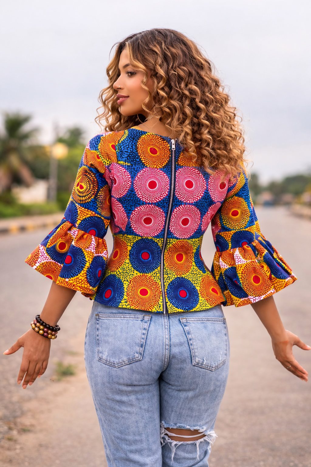 Vibrant Circular Print African Peplum Blouse