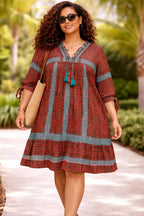 Women’s Rust African Print Dress with Blue Tassel Neck Detail