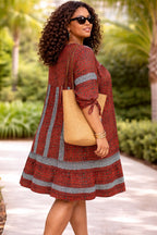 Women’s Rust African Print Dress with Blue Tassel Neck Detail