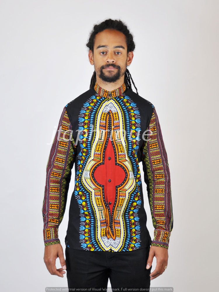 Frontal of model wearing a long sleeved dashiki shirt with multi-coloured traditional African print.