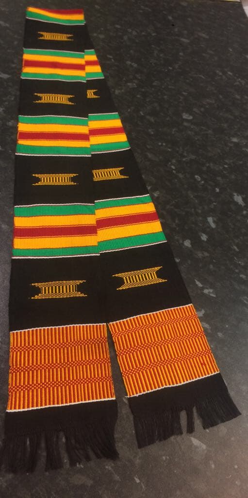 Shot of authentic Kente muffler or woven stole in multi-coloured traditional pattern.