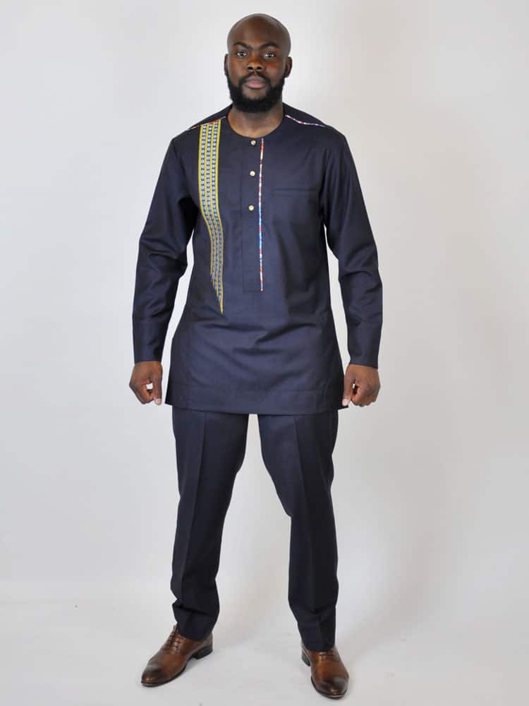 Full frontal of model wearing our men's authentic and traditional African suit in blue.