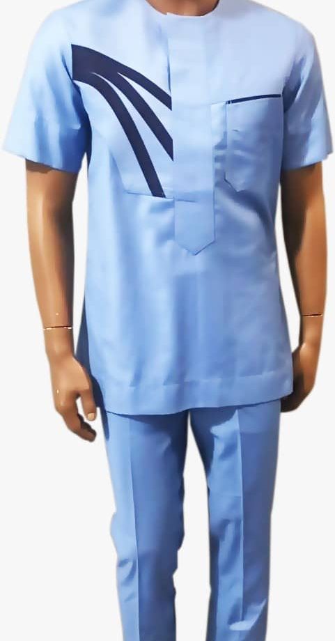 Full frontal of mannequin wearing a blue short sleeve men's African suit with a navy blue stripe pattern on right of chest.