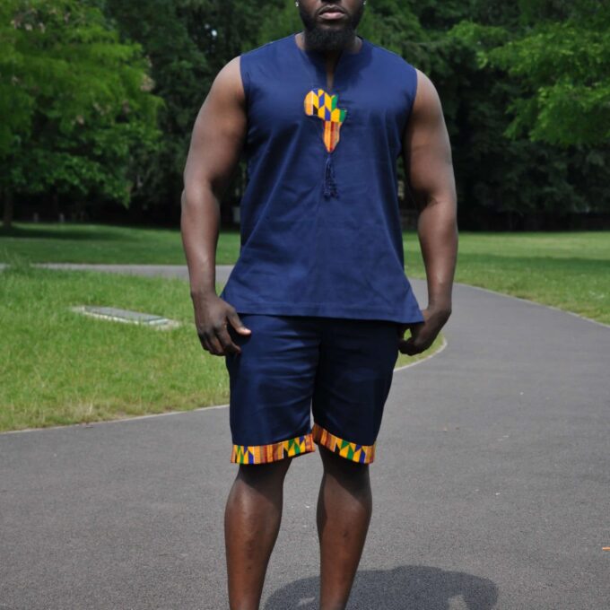 Blue & African Print Trim Short Pants Matching Set / Co-ord from African Clothing Store. Navy blue sleeveless tank top and matching shorts. Features a map of Africa in Kente print on the chest and African print trim on shorts hem and rear pocket. SKU: 19254