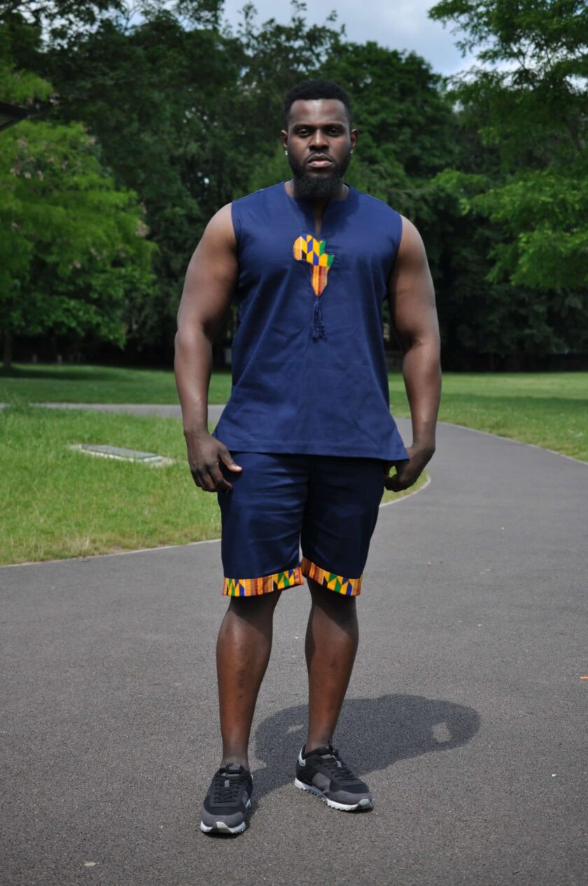 Blue & African Print Trim Short Pants Matching Set / Co-ord from African Clothing Store. Navy blue sleeveless tank top and matching shorts. Features a map of Africa in Kente print on the chest and African print trim on shorts hem and rear pocket. SKU: 19254