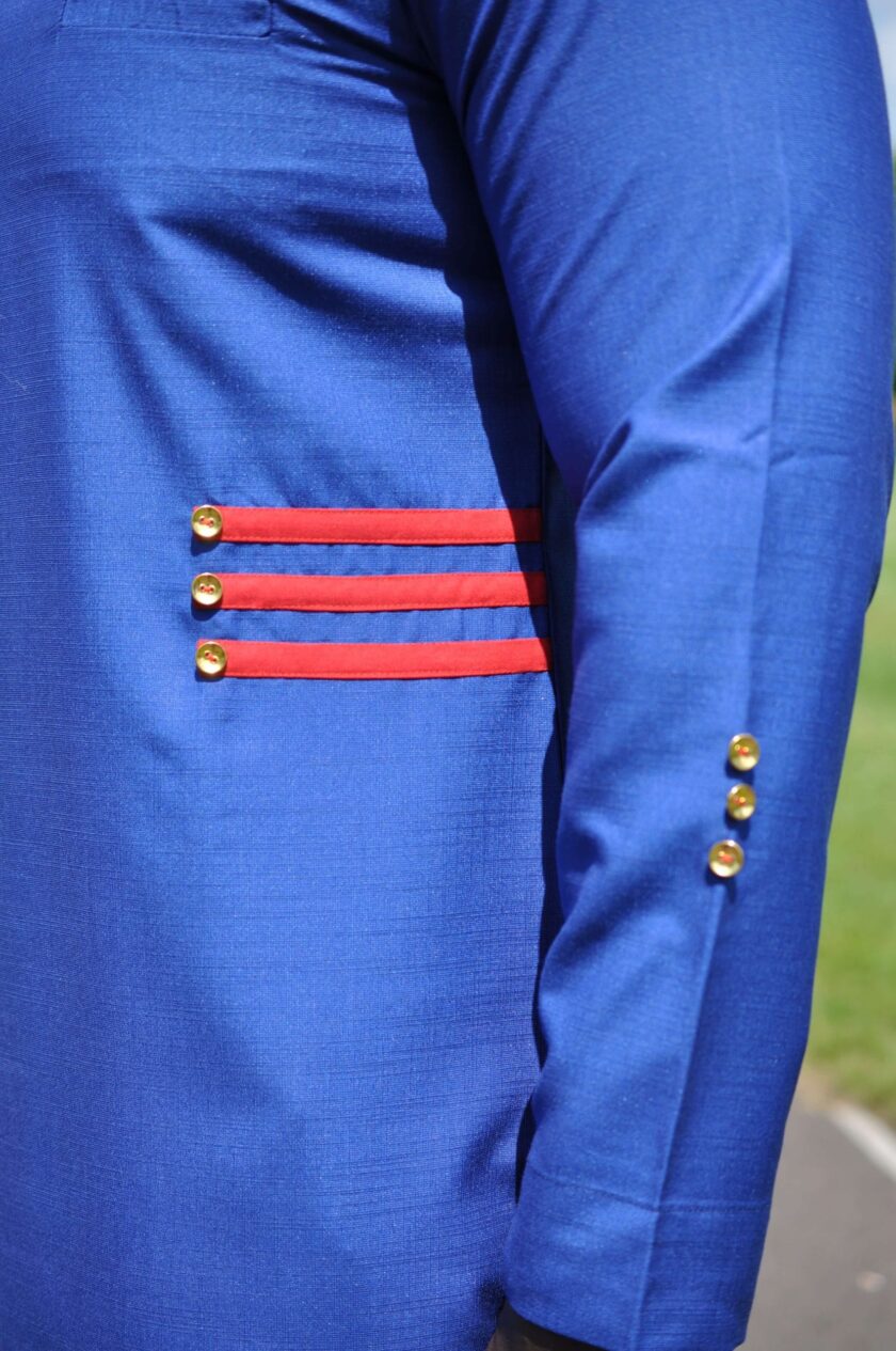 Close shot of stripe pattern which consists of three horizontal red stripes in a row with a button on each to the left.