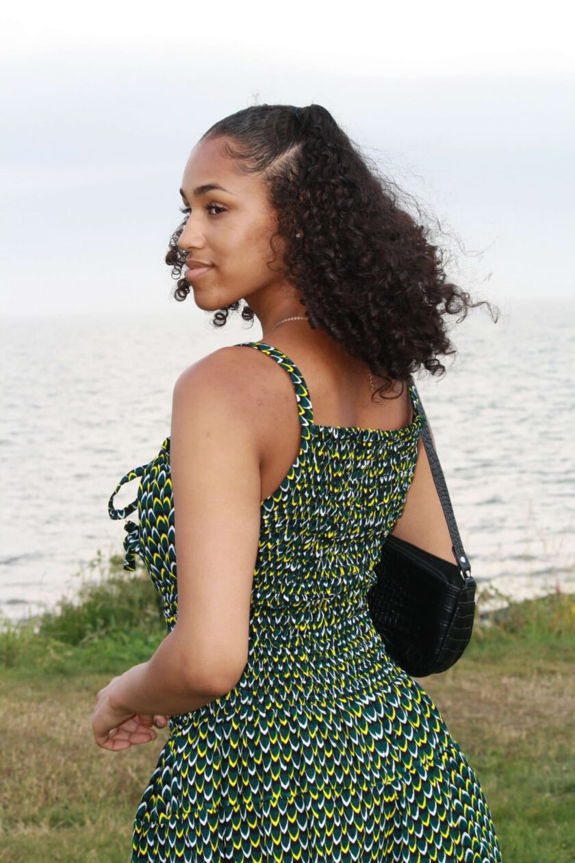 Close up back shot of model showing the shirred top for this African summer strap dress,