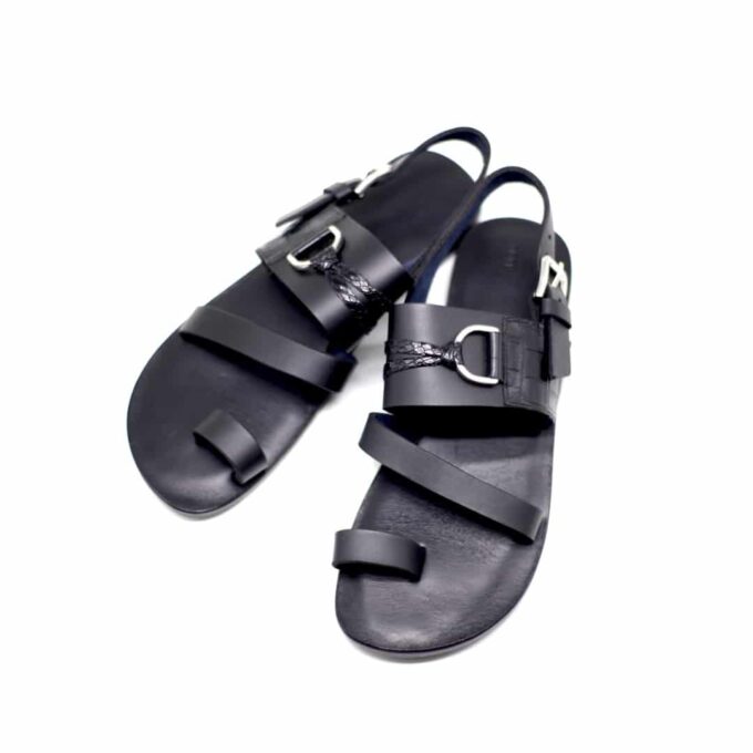 Shot of men's black toe loop leather strap sandals.