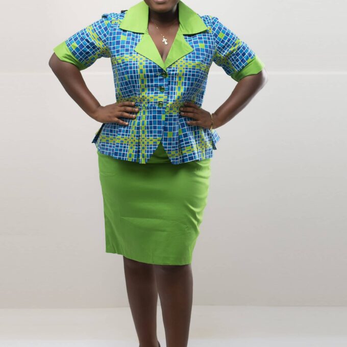 Frontal of model wearing our Nala two-piece skirt set in blue and green African print. Features a plain green pencil skirt and blue and green peplum top.