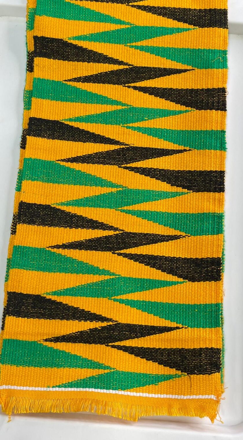 Our authentic hand woven African Kente Muffler or Stole in Jamaican flag colours and Afriican print pattern.