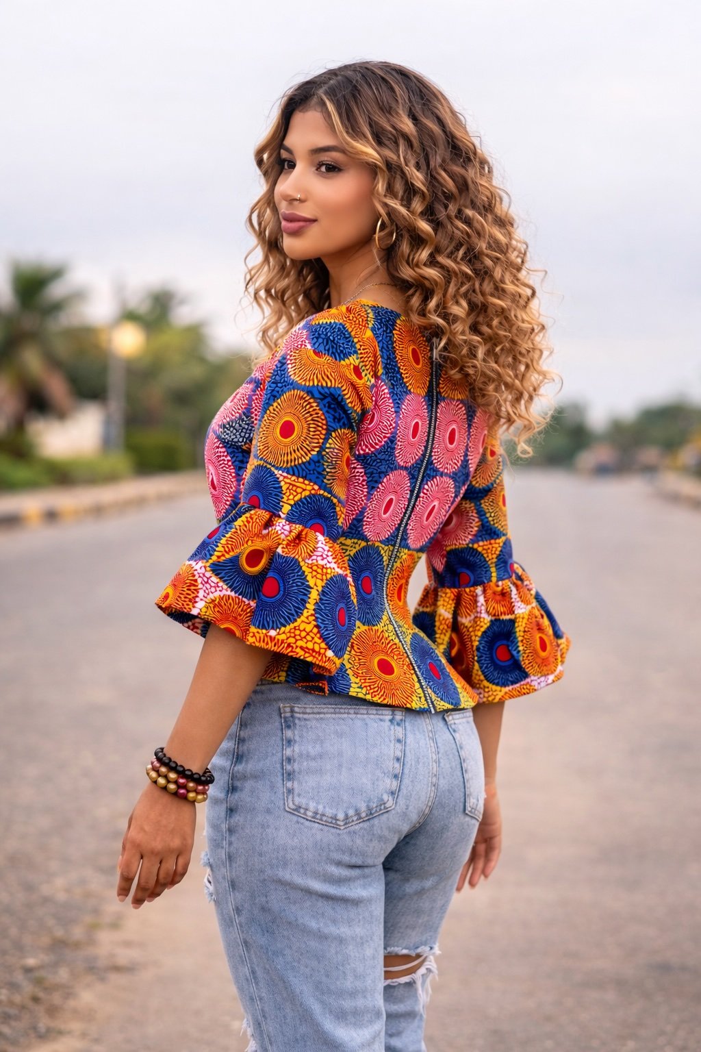 Vibrant Circular Print African Peplum Blouse - Image 4
